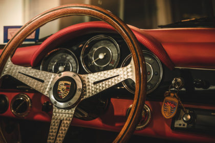 Classic Porsche dashboard with red detailing