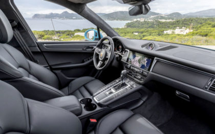 Porsche SUV interior with view of countryside